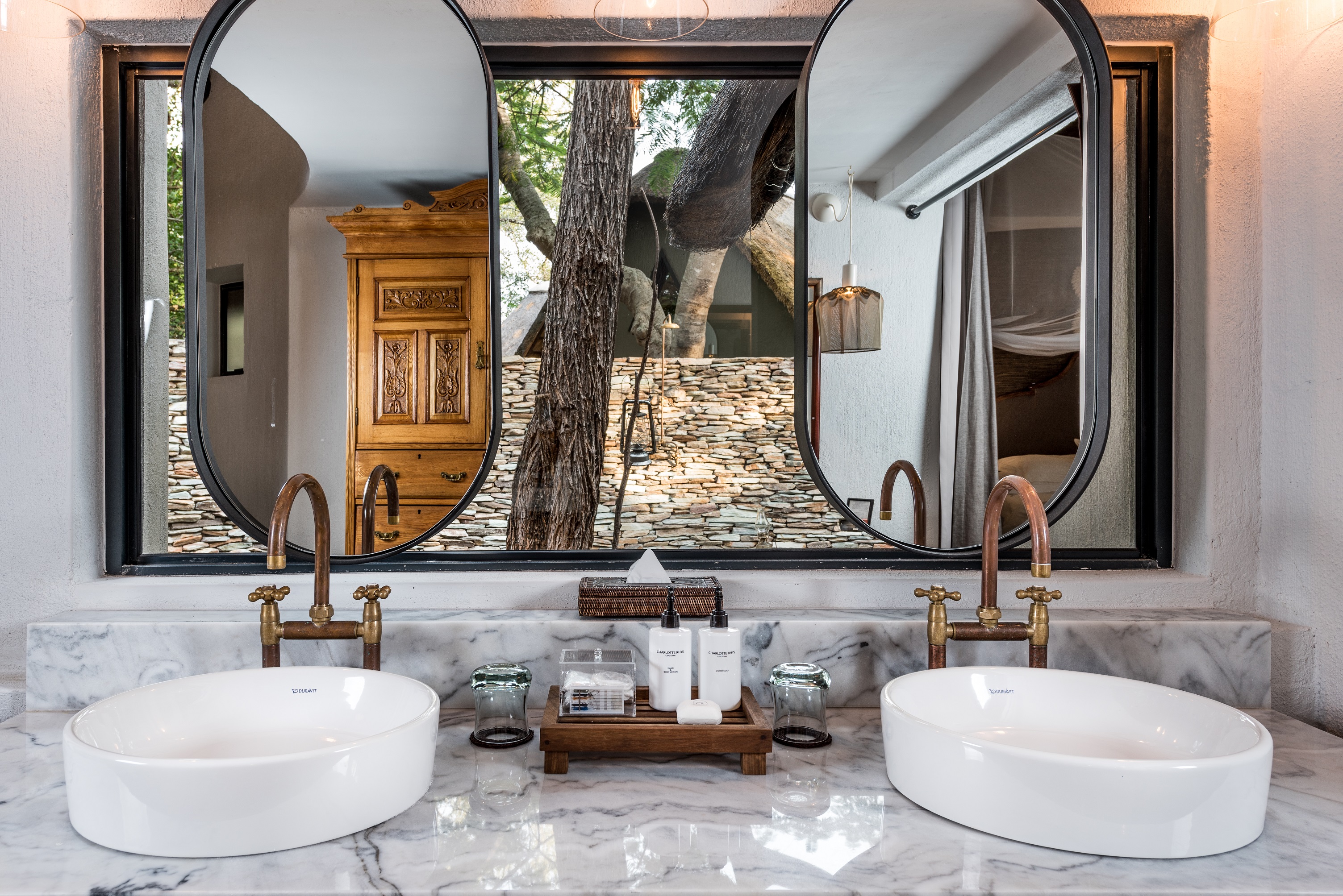 <p>The bathroom is designed to provide guests with a comfortable and relaxing environment, allowing them to unwind and rejuvenate after a day of safari activities.</p>
